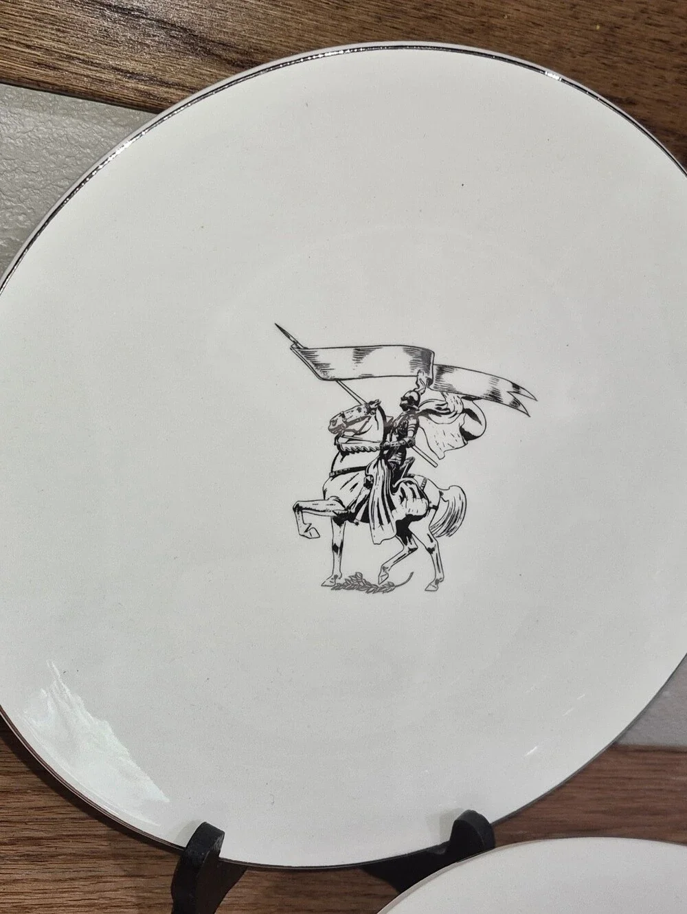 Set Of 6 Plates W/ A Medieval Knight on a horse carrying a Banner or Flag.